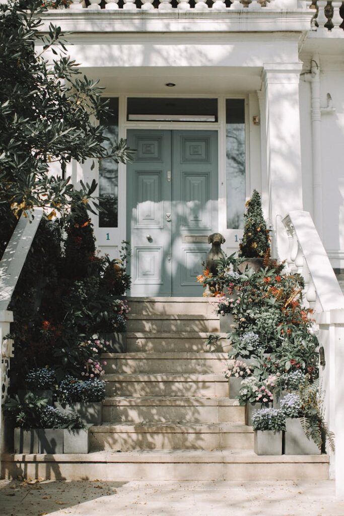 Green Plants on White Concrete Staircase